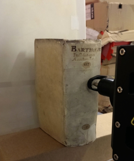 The head of the MA-XRF scanner working at the 16th-century binding of Leiden, University Library, 617 F 19